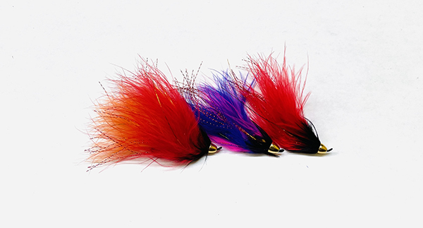 Psycho Leech Conehead fishing flies with marabou tail and flash