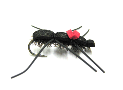 Foam-bodied black Chernobyl Ant designed to imitate ants, beetles, and hoppers for trout.- fly fishing flies