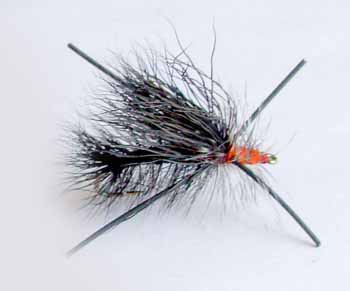 Stimulator Black with Legs dry fly featuring black body, elk hair wing, and rubber legs. Fishing flies.