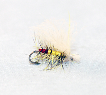 Stonefly imitation Yellow Sally Spent designed for trout during summer spinner falls. Fishing flies.