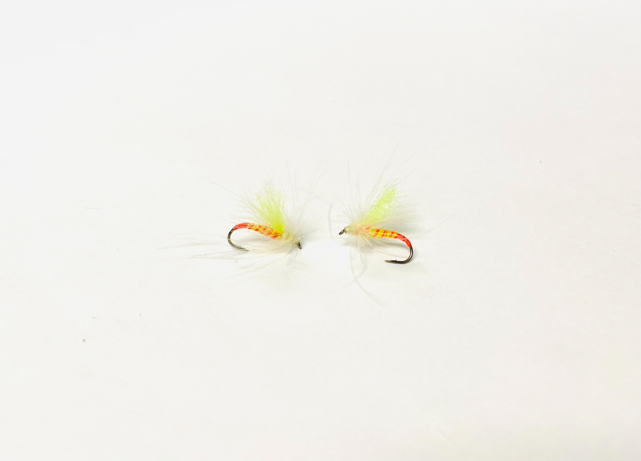 Yellow Sally CDC Wing dry fly with slim yellow body and delicate CDC wings. Fishing Flies.