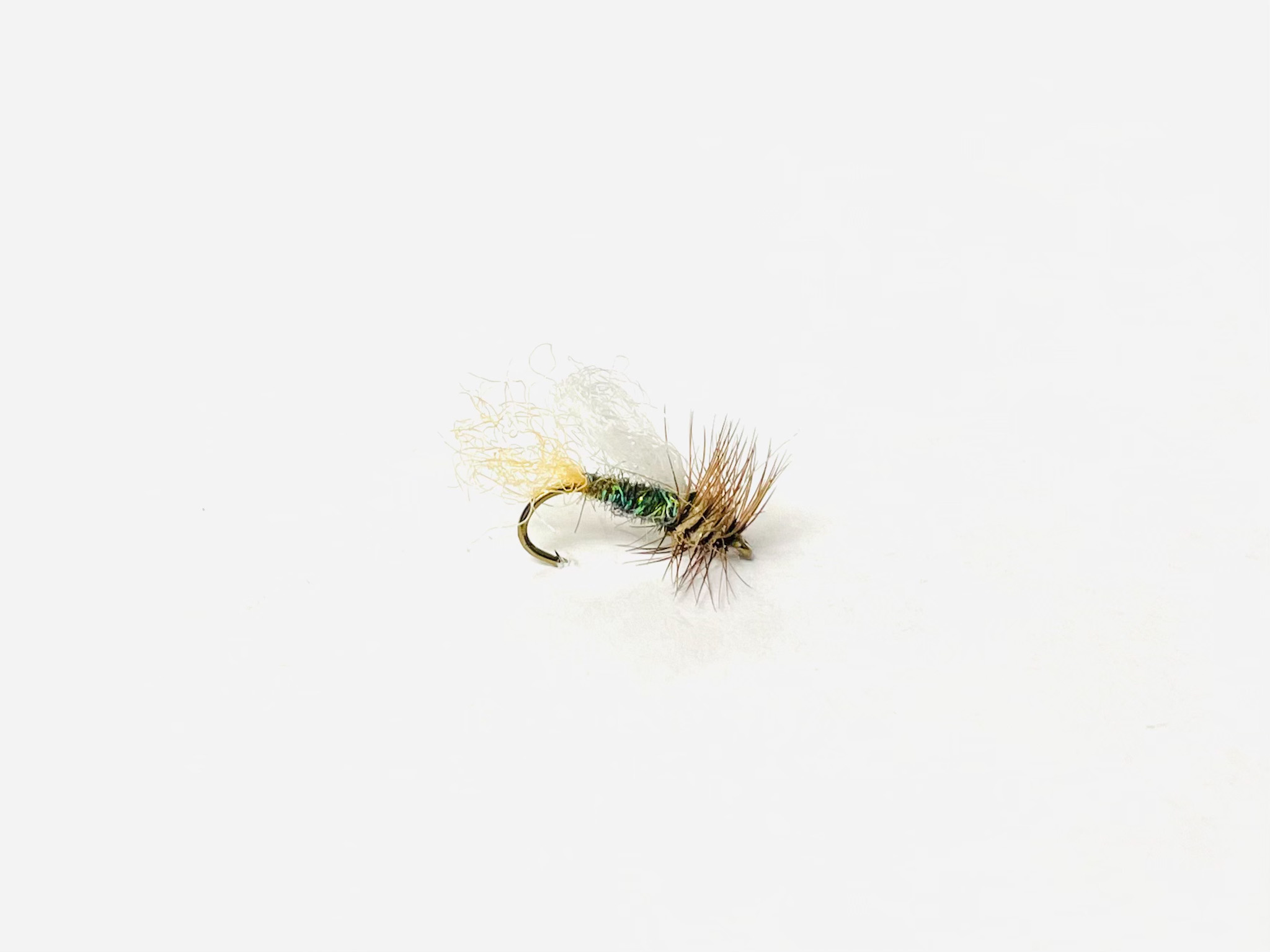 Caddis Emerger Variant is a versatile fly that imitates a caddis pupa as it transitions to an adult.