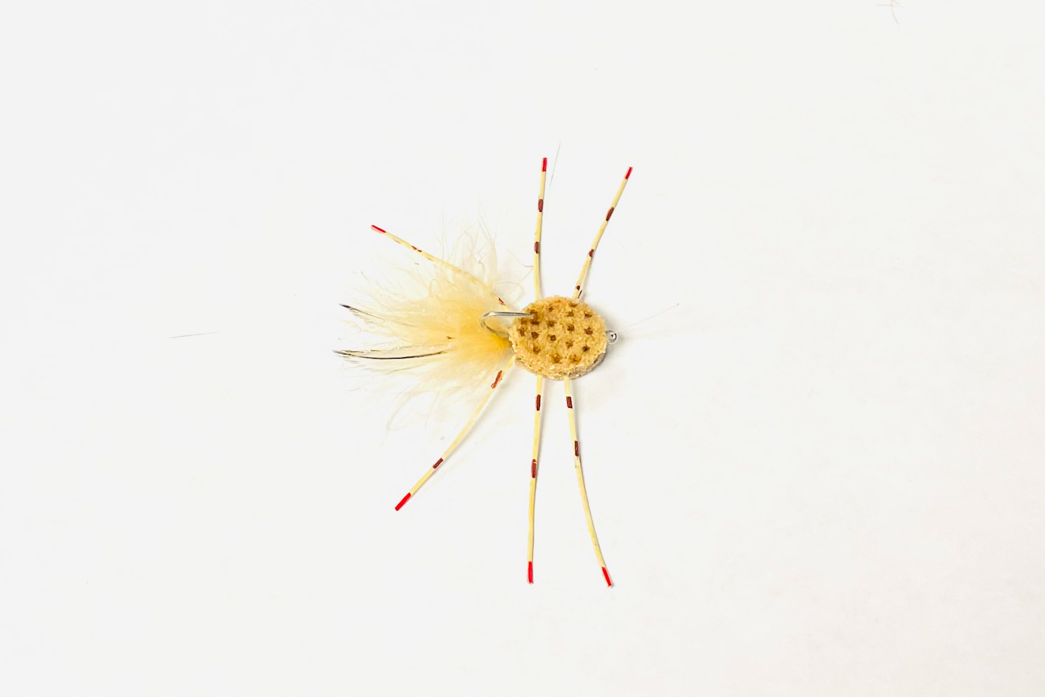 The Crab Crazy Legs is a realistic saltwater pattern designed to imitate small crabs