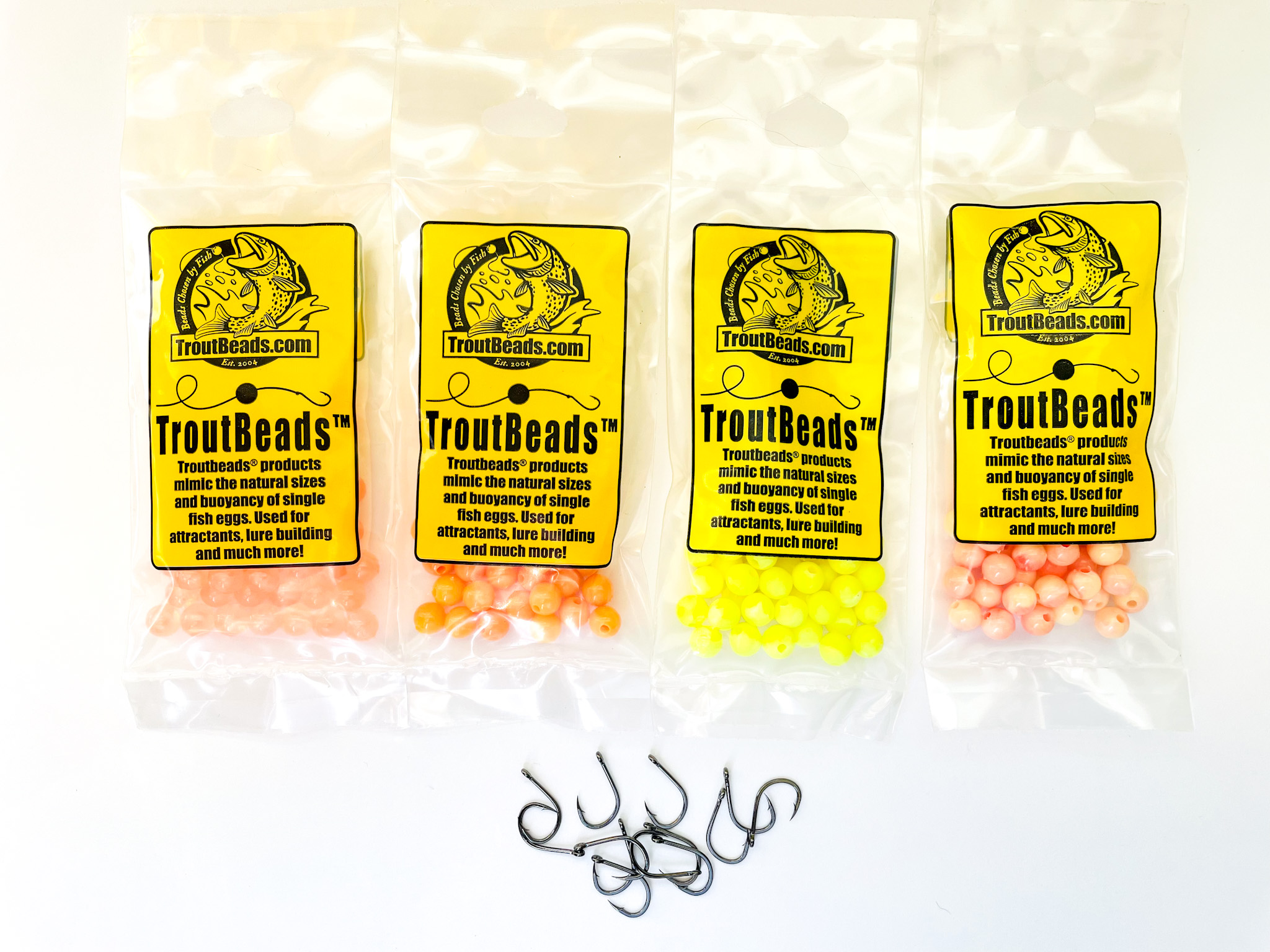 TroutBeads in multiple colors imitating natural salmon and trout eggs for fly fishing.