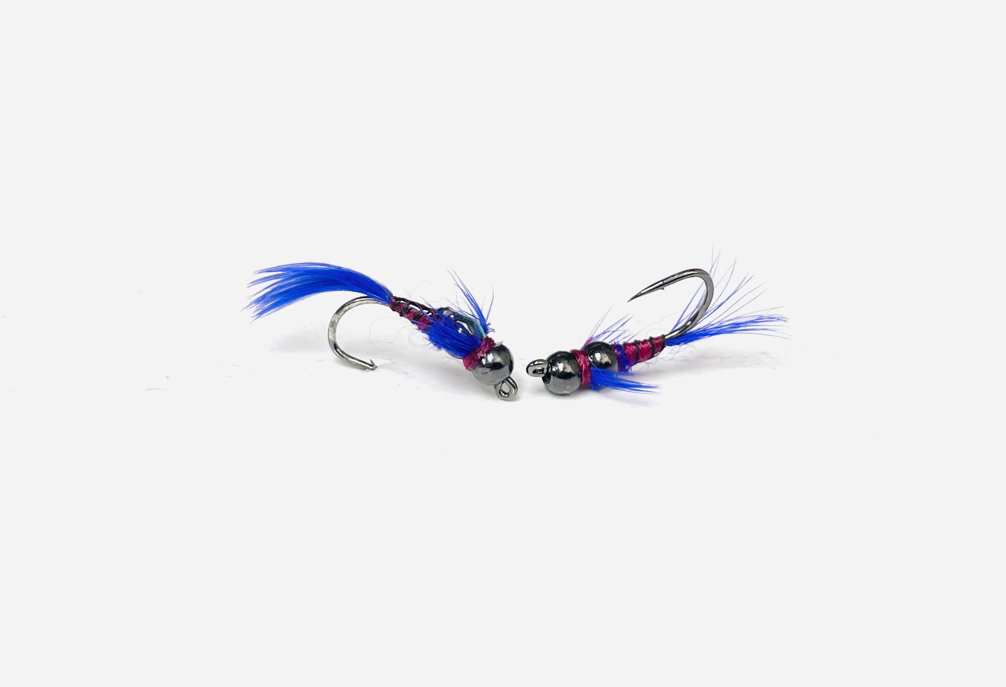 2 Bit Hooker Purple T.H. Jig is a bold and highly effective Euro-style nymph fishing fly designed to sink fast and get noticed.