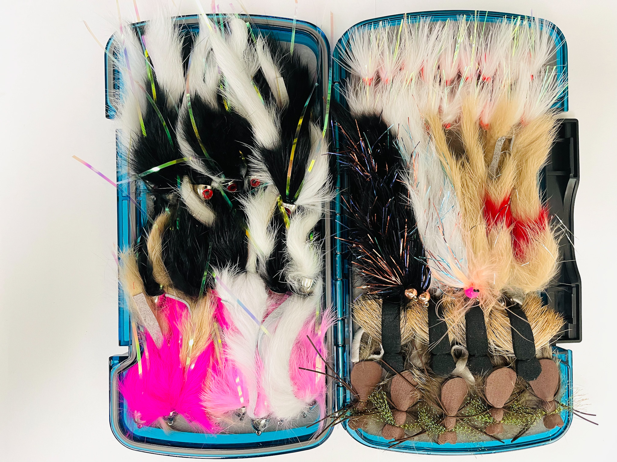 59 PCS Beyond Boundaries Package with assorted trout flies including dries, nymphs, and streamers.