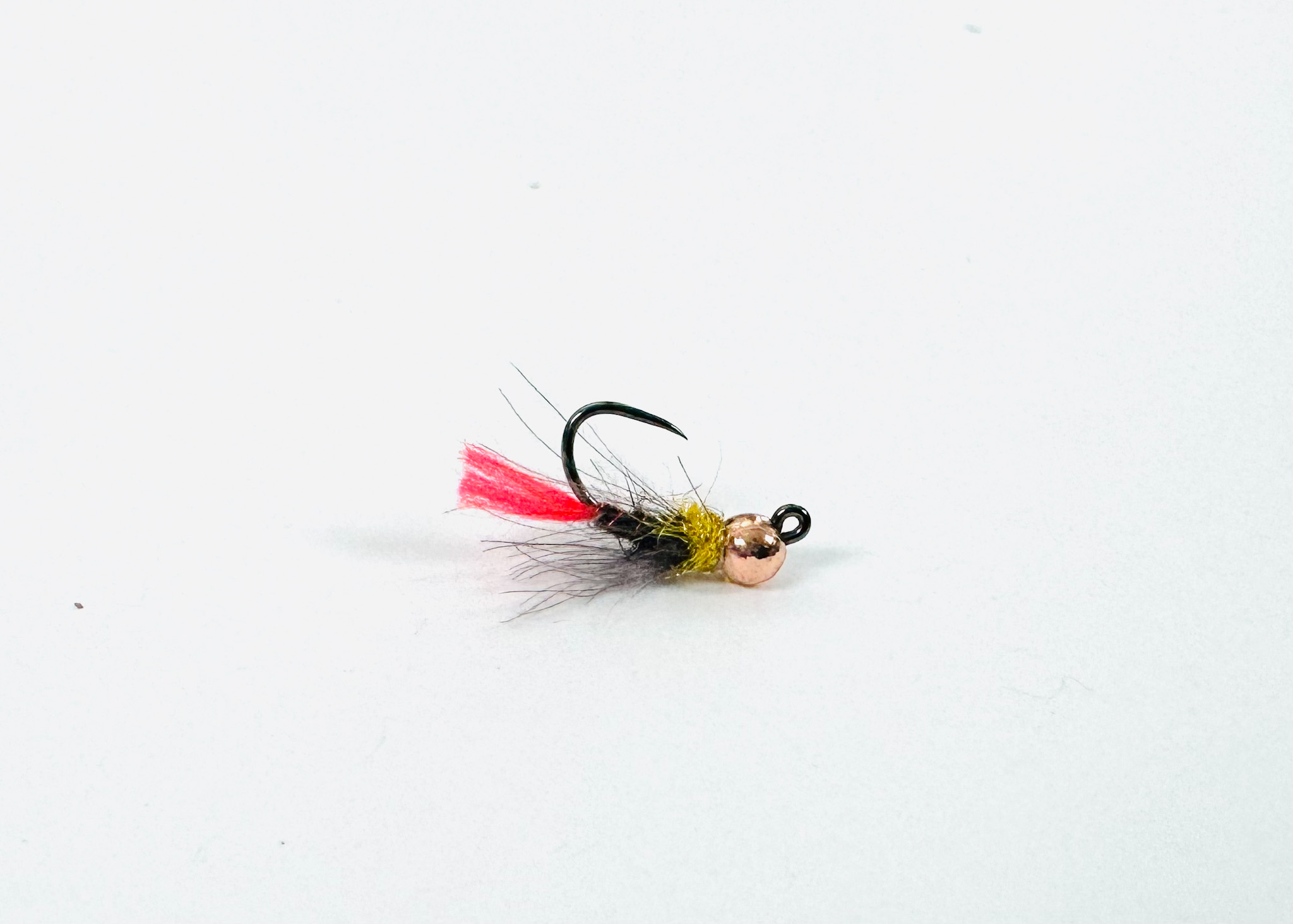 Night Crawler Tungsten Jig Hook fly with elongated body and tungsten bead, imitating aquatic worms for trout fishing