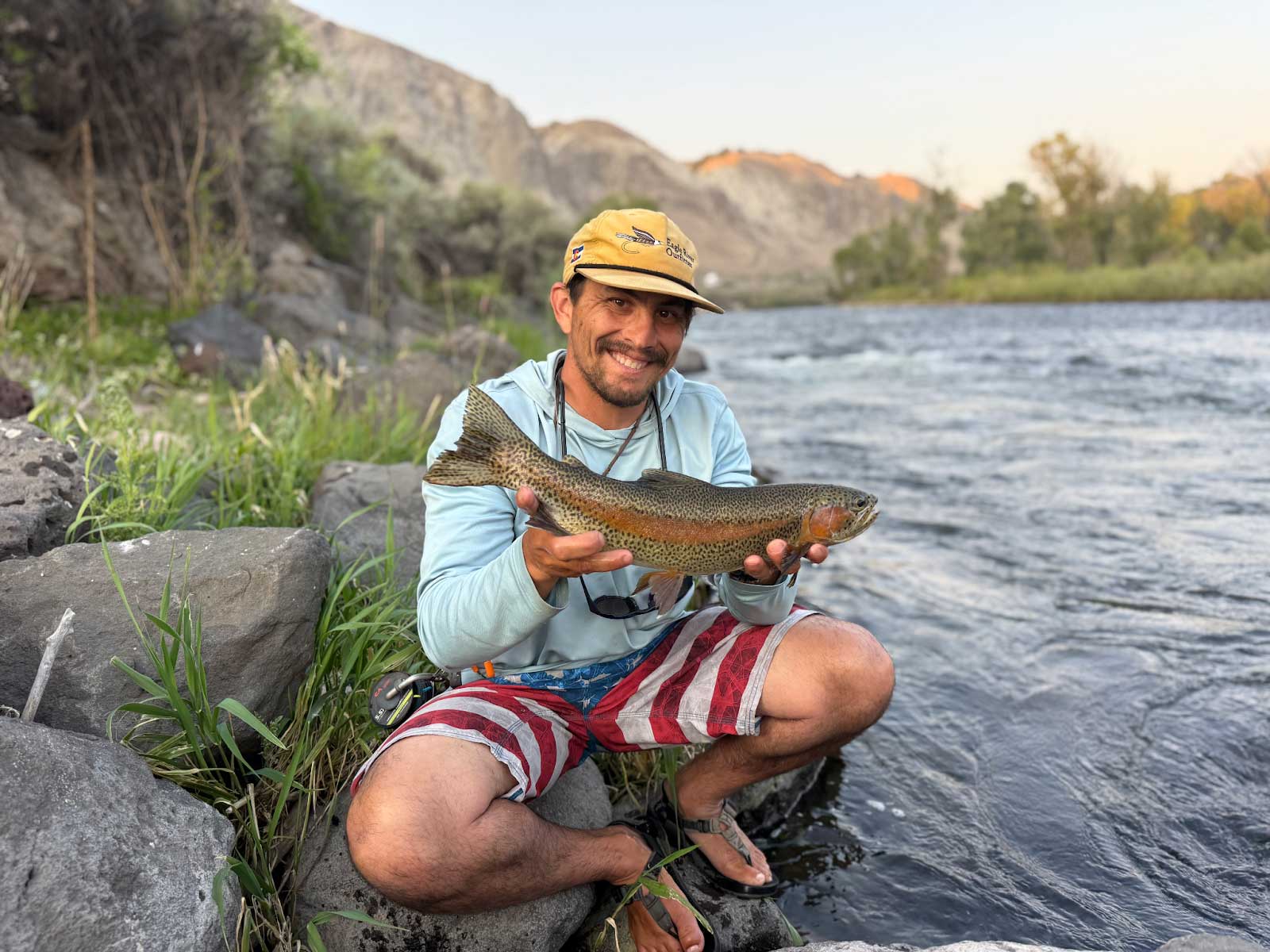 Hill's Discount Flies online shop - Fly Fishing Flies - Eagle River Outfitter guide with fish